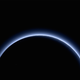 Illustration for article titled You Can See the Color of the Sky in the Newest Pluto Pictures—and Its Blue